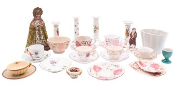 A mixed group of ceramics including a pearl ware figure of Winter, a creamware plate,