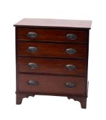 A mahogany dwarf chest of drawers in Regency style, early 20th century; the top with reeded edges,