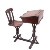 A Victorian walnut and cast brass mounted model of a school desk,