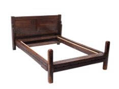 An oak bedstead,