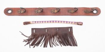 A mixed collection of horse tack, includ