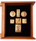 A cased group of seven early 20th centu