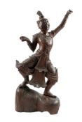 A Burmese carved wood dancing figure, 69