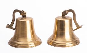 Two reproduction brass ship's bells.