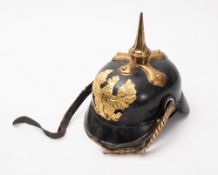 A reproduction Prussian Pickelhaube. Wit