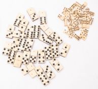 A complete set of twenty eight bone and ebony backed dominoes, early 20th century; sixes downwards,