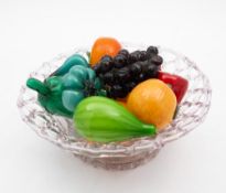 A clear glass lattice basket containing