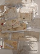 Great Britain. A collection of pre-stamp postal history, with descriptions, in plastic sleeves.