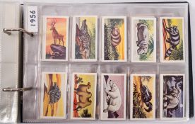 Ty-phoo and others. Four albums of various trade cards, various subject matter and publishers.