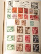 Five stamp albums including two well-filled Movaleaf,
