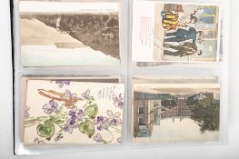 Two albums of early 20th century postcards, mainly GB topographical including views of Tower Bridge,
