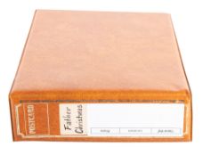 An album of early 20th century Christmas and Easter themed postcards,