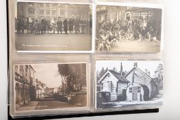 An album of early 20th century postcards,