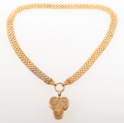 An impressive Victorian trefoil locket on a mesh link collar necklace,