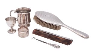 A small mixed lot of silver, to include a christening mug, inscribed, an egg cup, inscribed,