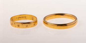 Two 22ct gold wedding bands, including a plain wedding band, UK hallmark,