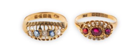 Two early 20th century 18ct gold gem-set rings, including a five stone diamond and sapphire ring,