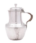 A 19th century French silver jug, of baluster form, with a cane insulated handle and a ball finial,