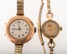Two lady's gold wristwatches to include: Girard-Perregaux an 18K gold wristwatch the round dial