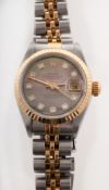 Rolex Oyster a lady's two-tone Datejust wristwatch the mother-of-pearl dial having diamonds inset
