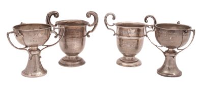 Four 20th century silver trophy cups, all inscribed, mixed makers & dates;