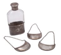 A 20th century set of three silver wine labels, crescent form,