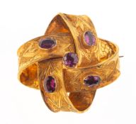 A Victorian ribbon brooch, of openwork knotted ribbon form, with foliate carved and textured finish,