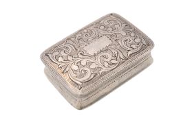 An early 19th century silver vinaigrette, oblong cushion-shaped,