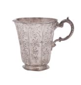A continental silver jug, tapering circular form, with a panelled body,