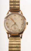 Omega Automatic a gentleman's 9K gold wristwatch the silvered dial having raised gold Arabic