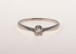 A diamond solitaire ring, claw set with a brilliant-cut diamond,