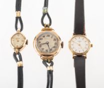 Three wristwatches to include A 1930s silver wristwatch the dial having etc etc,