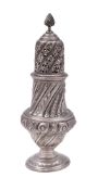 A late Victorian vase-shaped silver sugar caster, profusely decorated with embossing & chasing,