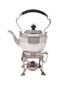 An Old Sheffield plated tea urn or samovar, circular form, on a shaped pedestal base, with paw feet,