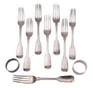 Eight Fiddle pattern silver table forks, five crested, by Richard Britton,