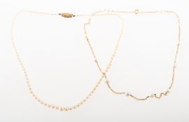 Two cultured pearl necklaces of varied design, including a string of graduated cultured pearls,
