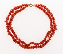 A double row coral necklace, base metal jump ring and bolt ring, length of inner row approx. 34.