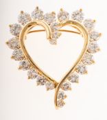 A modern diamond heart shaped brooch, the heart of openwork cross-over style,