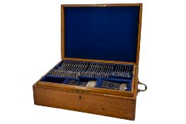 An Edwardian cased part-canteen of Fiddle pattern silver flatware, to include 12 table forks,