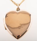 A 9ct gold heart shaped locket with chain, an early 20th century 9ct gold heart shaped locket,
