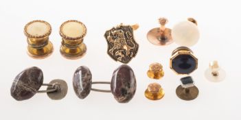 A mixed collection of dress studs and cufflink's,