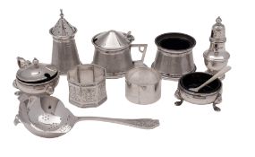 A George VI three-piece silver condiment set, tapering circular form,