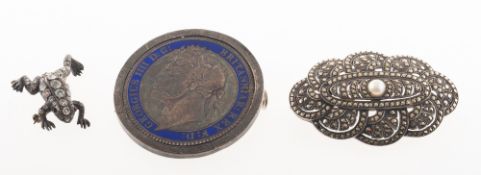 Three antique brooches of varied design,