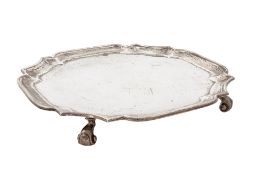 A George V small silver salver, of shaped square outline,
