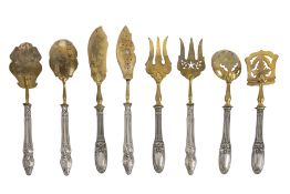 Two sets of four late 19th/ early 20th century continental silver-handled hors' d'oeuvres servers,