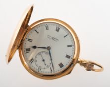 Charles Frodsham an 18K gold full-hunter pocket watch the white enamel dial having black Roman