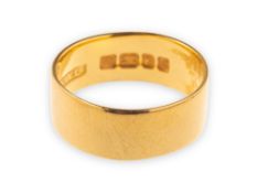 A 22ct yellow gold wedding band, UK hallmark, width of band approx. 6.5mm, size approx. K, 4.1grams.
