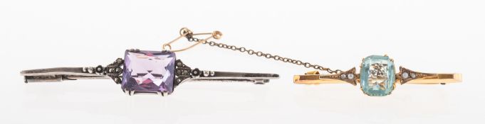 Two brooches of varied design, including a bar brooch,