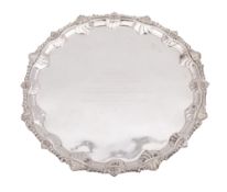 A late Victorian silver salver, of shaped circular outline,