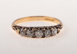 A five stone diamond ring, grain set with five graduated old-cut diamonds, diamonds approx. 0.